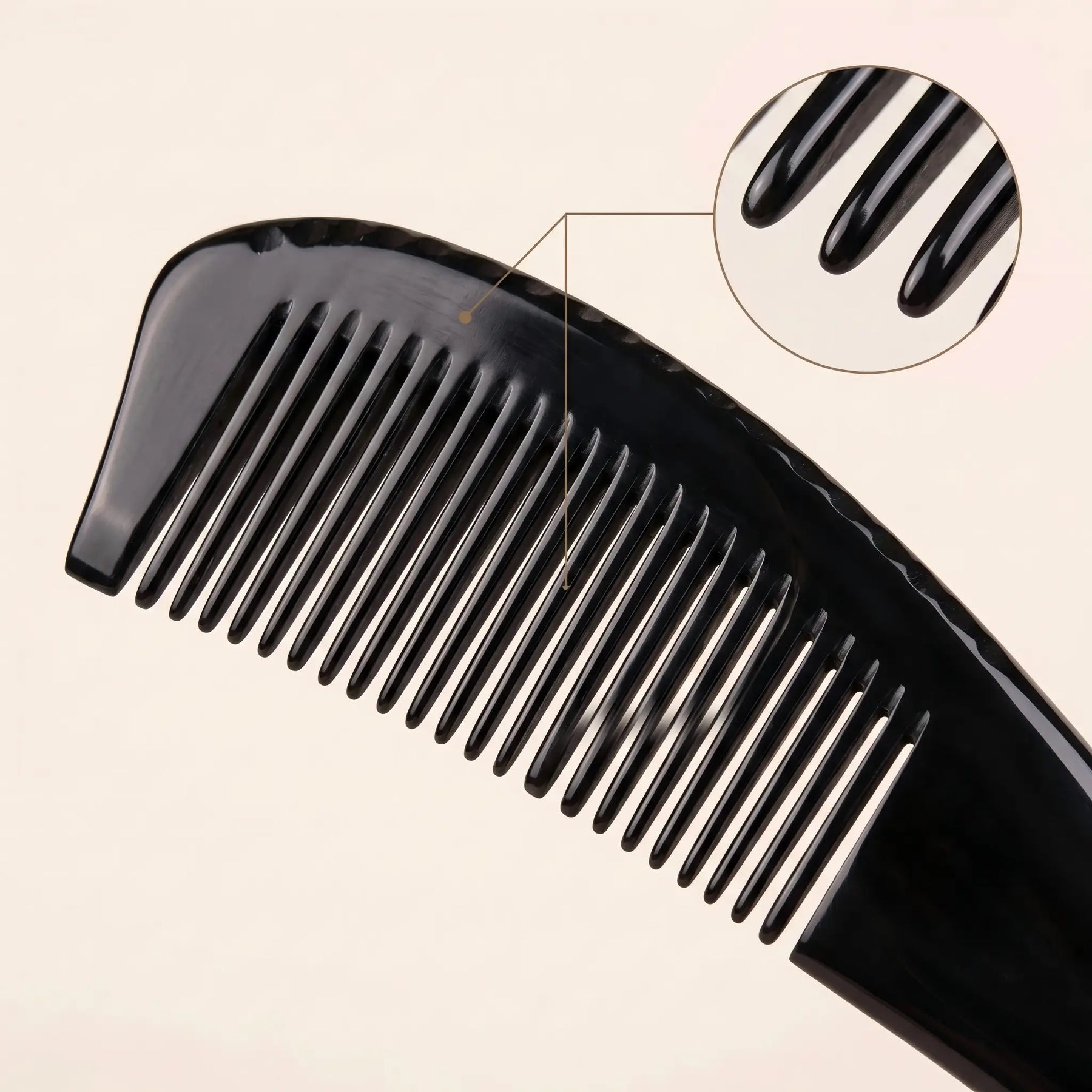 COZUY black ox horn pointed-tail comb close-up showing glossy black horn and polished fine teeth. detail image 2