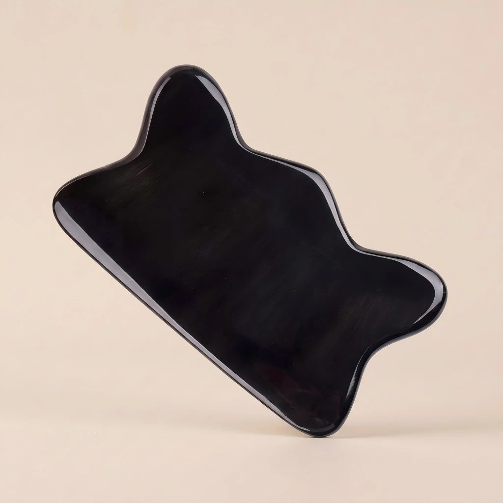 A Cozuy natural beauty tool standing on a beige background, perfect for a mindful scalp care routine