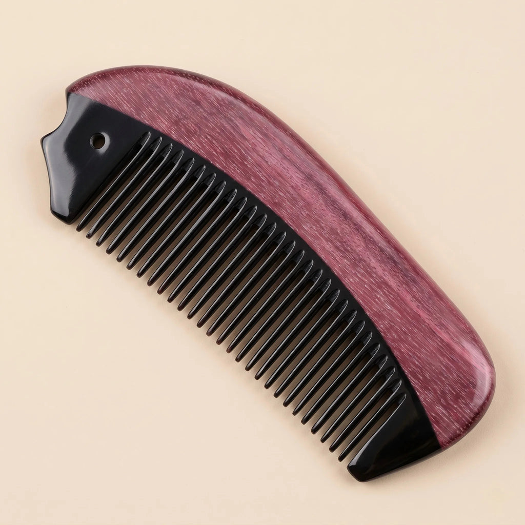 Curved natural horn pocket comb resting on a beige background, versatile scalp gua sha tool.