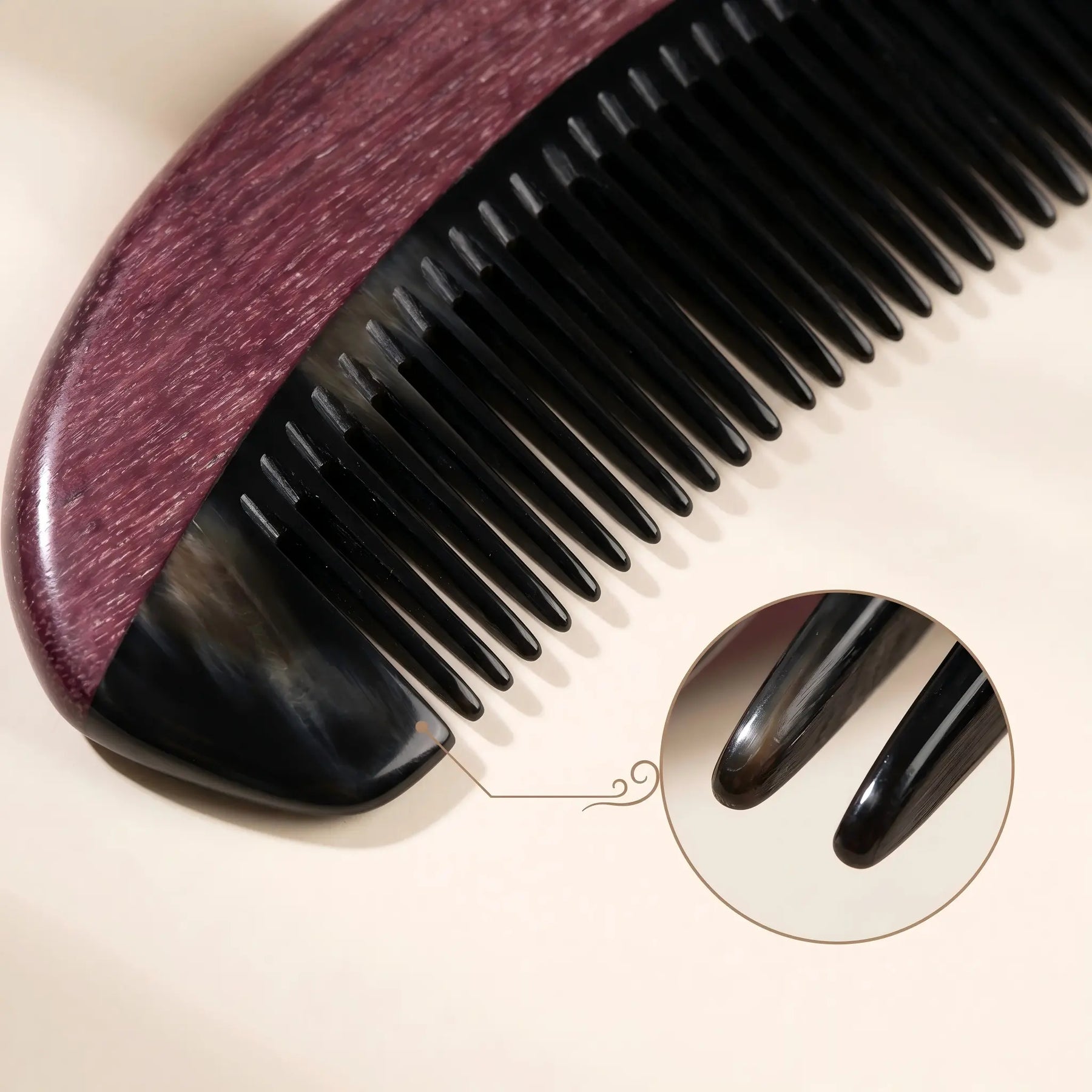 COZUY purpleheart and black ox horn pocket comb close-up showing wood overlay, black horn body and polished fine teeth. detail image 2