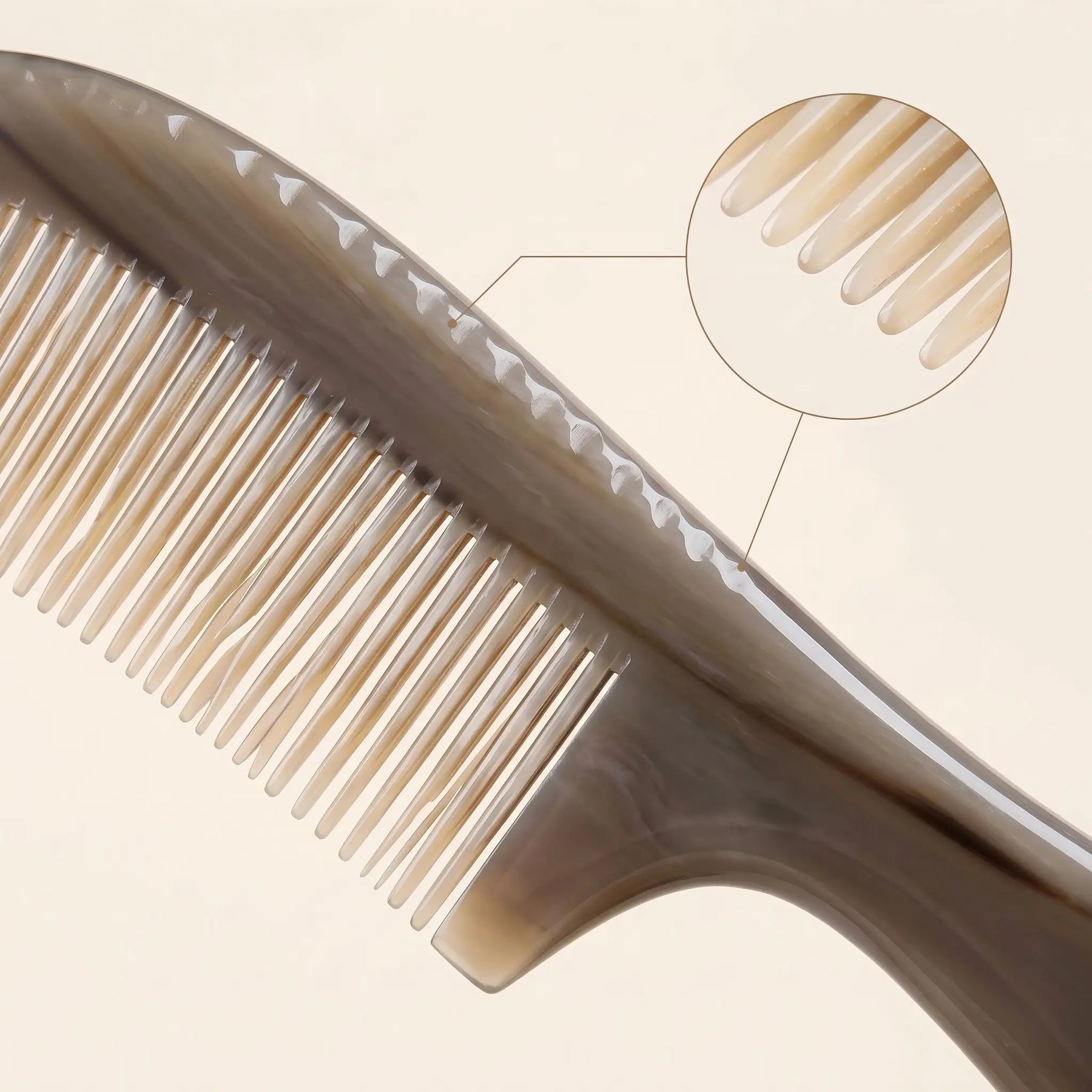 COZUY translucent yak horn handle comb close-up showing layered yak horn grain and polished fine teeth. detail image 2