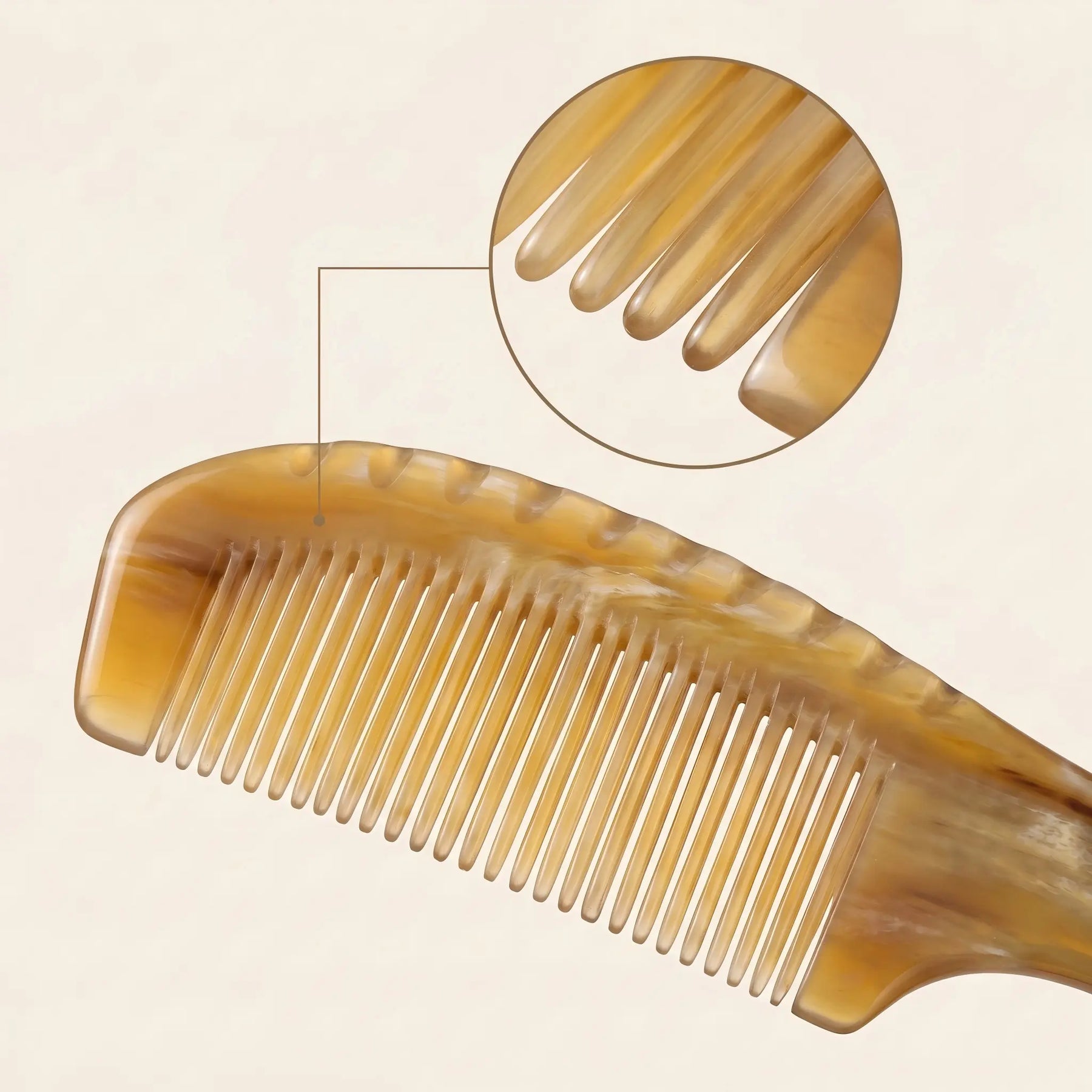 COZUY marbled white yak horn comb close-up showing clouded white horn grain and polished fine teeth. detail image 2