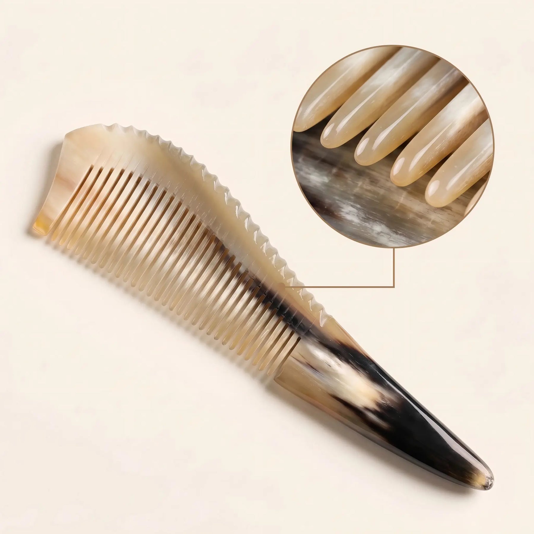 COZUY yellow ox horn pointed-tail comb close-up showing golden horn grain and polished fine teeth. detail image 2